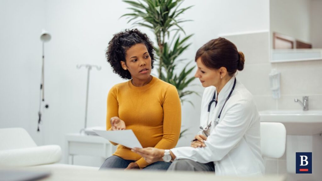 Medical evidence: a woman talks to her doctor.